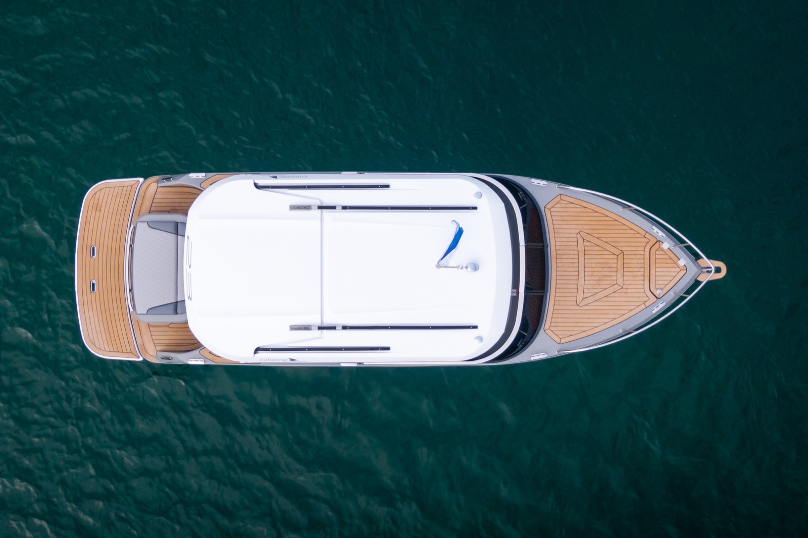 Drone view of the Alfastreet 23 Cabin Evo Electric from above, showing the full deck layout